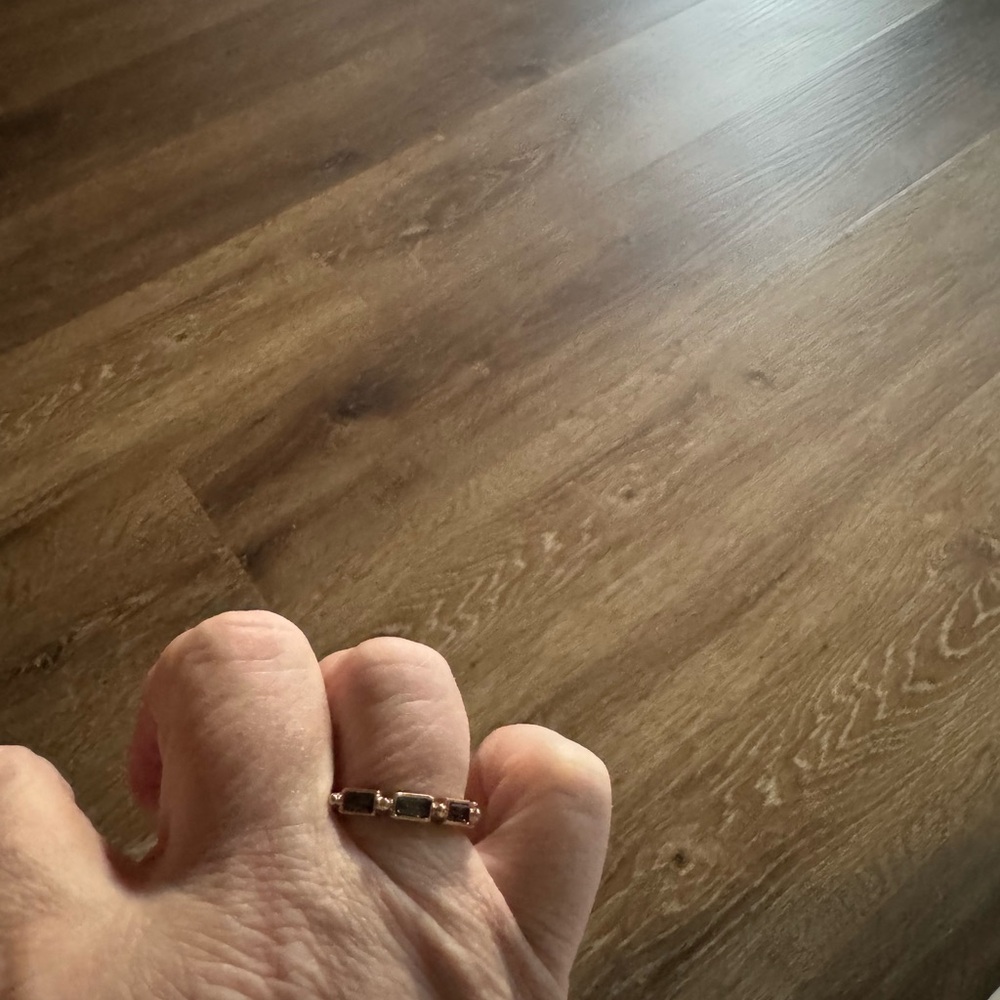 Elegant Gold and Black Ring